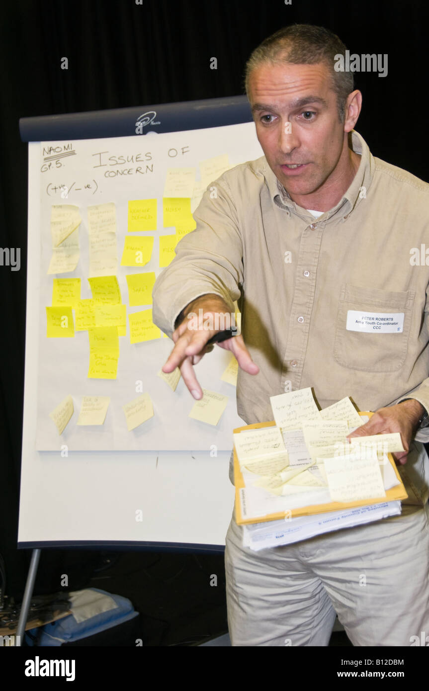 Professional man youth worker at a conference in Aberystwyth discussing anti social behaviour problems linked to alcohol, UK Stock Photo