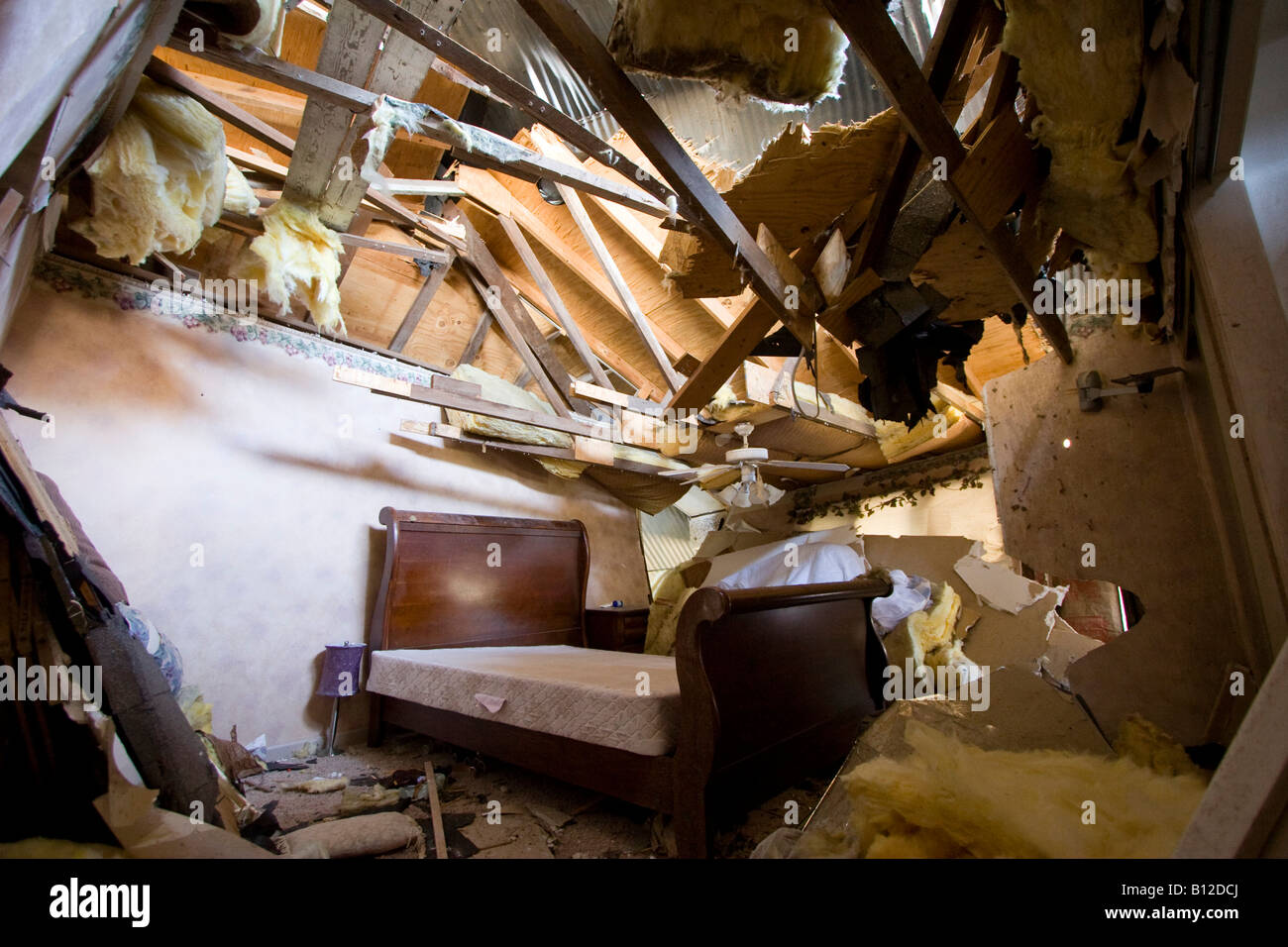 A bedroom destroyed by a tornado in Aurora, Nebraska, USA. Stock Photo