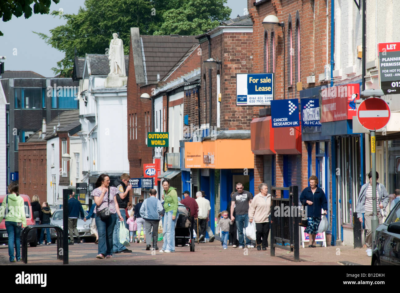 Shopping in the pedestrianised Chapel Street Chorley town centre Lancashire Stock Photo Alamy