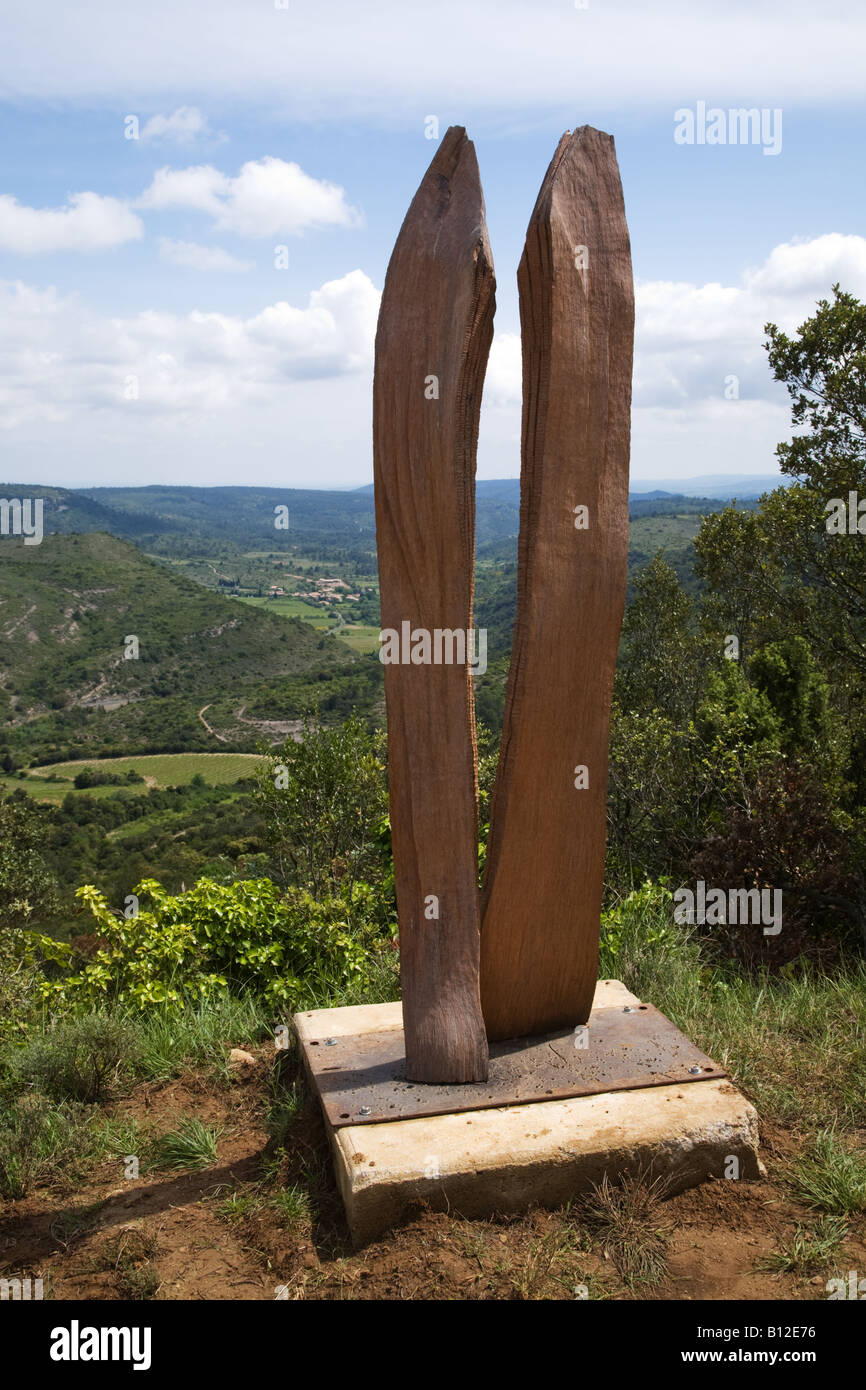 French wooden carving overlooking the Pyrenees landscape Stock Photo