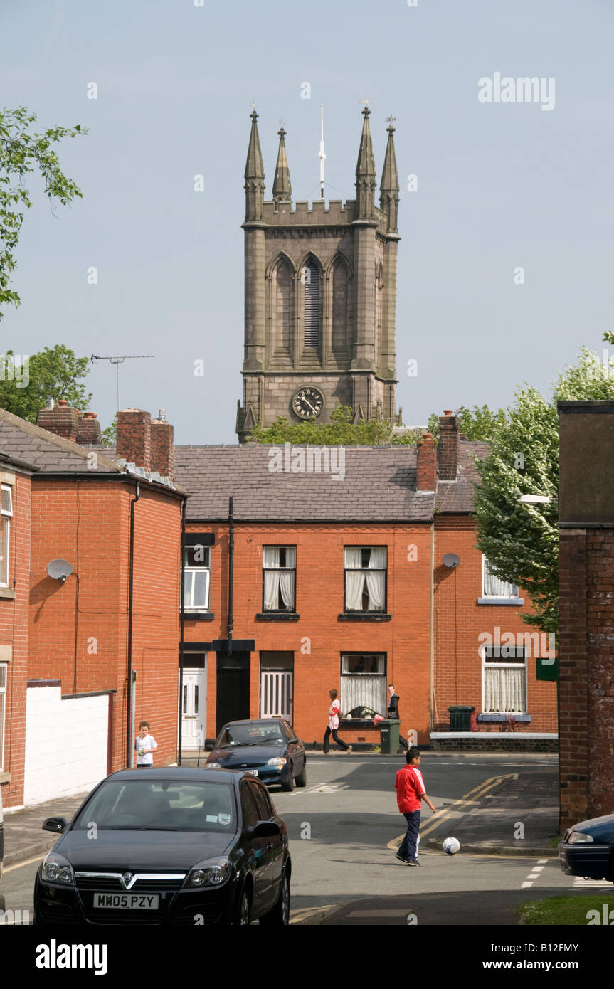 church tower and terraced houses in street, Chorley town centre Lancashire UK Stock Photo Alamy