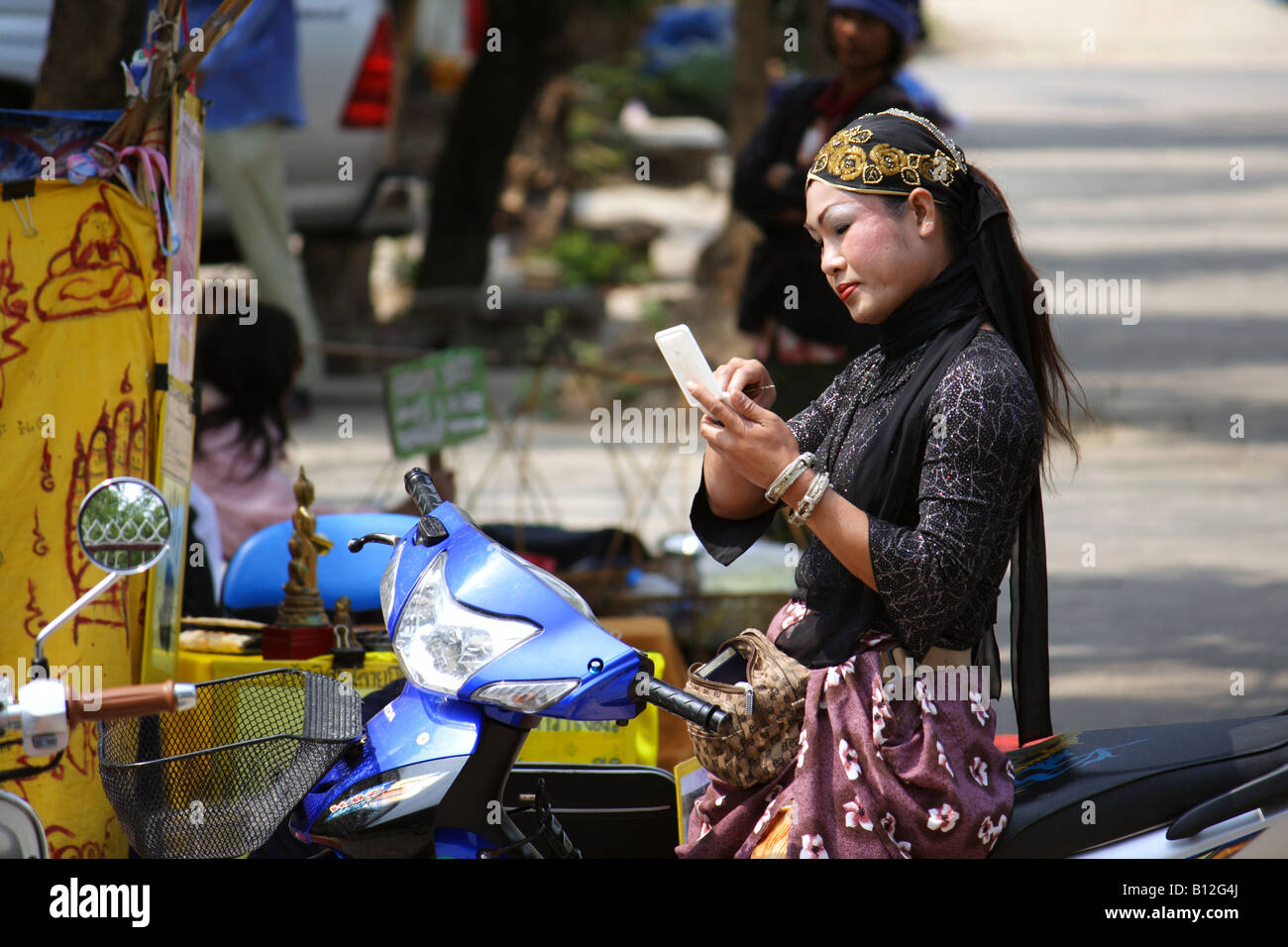 person applying make up in Thailand Stock Photo