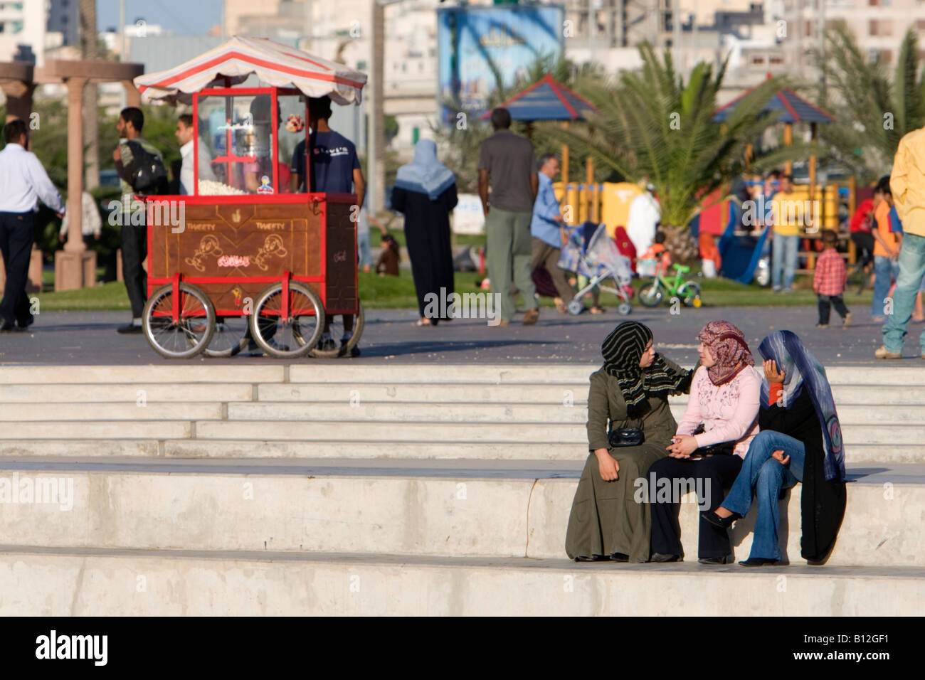 Tripoli, Libya, North Africa. Modern Libyan Women's Clothing Styles,  Public Park near the Green Square.  Girls Talking. Stock Photo