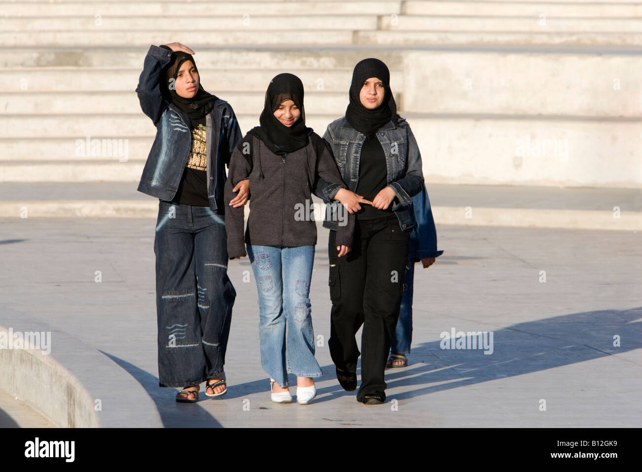 Tripoli, Libya, North Africa.  Teenage Libyan Girls' Clothing Styles in Public Park near the Green Square, downtown Tripoli. Stock Photo