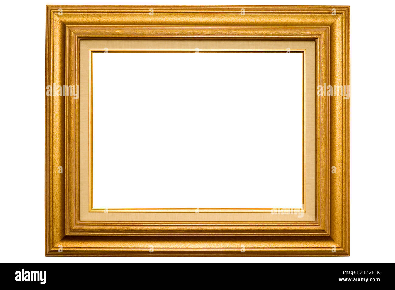 A gold coloured picture frame with beige canvas border isolated on a white background Stock Photo