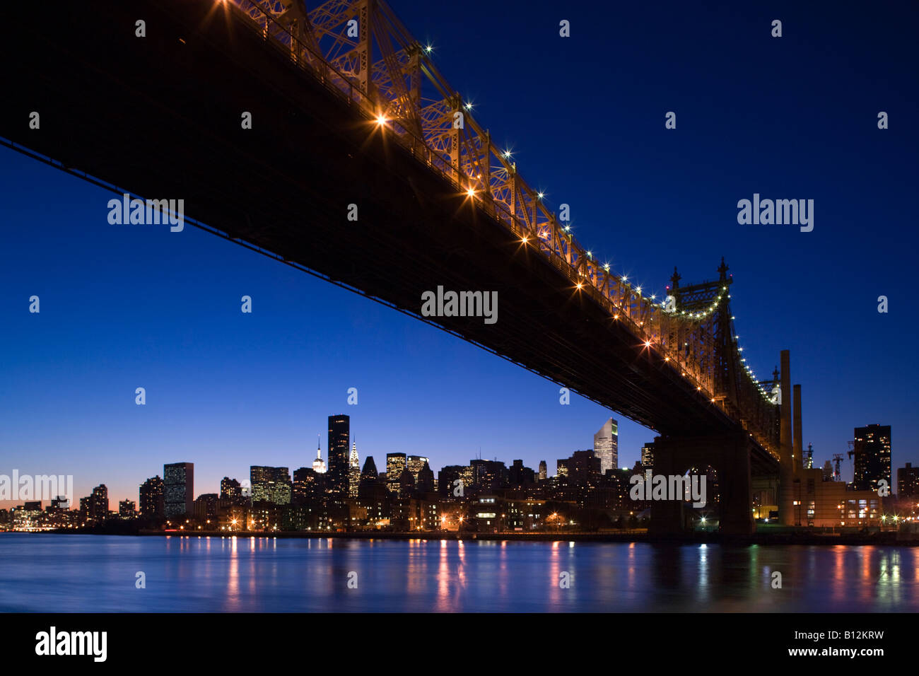 QUEENSBOROUGH BRIDGE MIDTOWN SKYLINE MANHATTAN NEW YORK USA Stock Photo