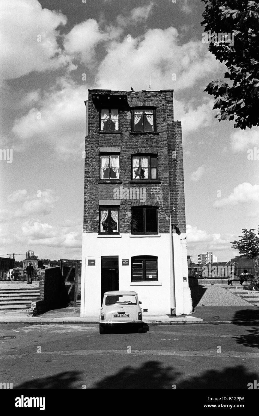 Thames riverside house in Rotherhithe southeast London with Mini car 1981 Stock Photo