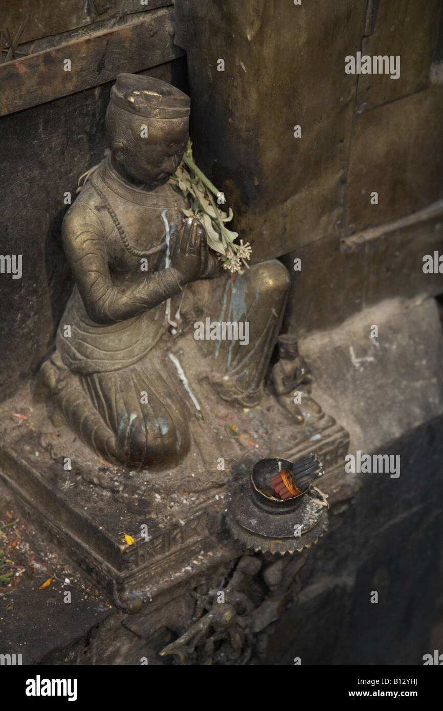 kneeling buddha close up buddhist shrine Stock Photo Alamy