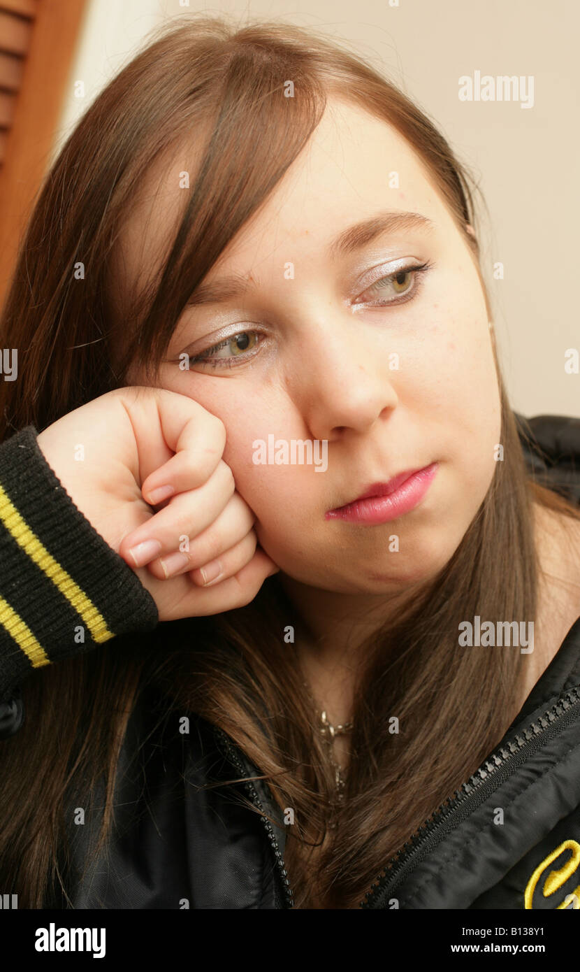 Young teenage girl looking sad and moody Stock Photo