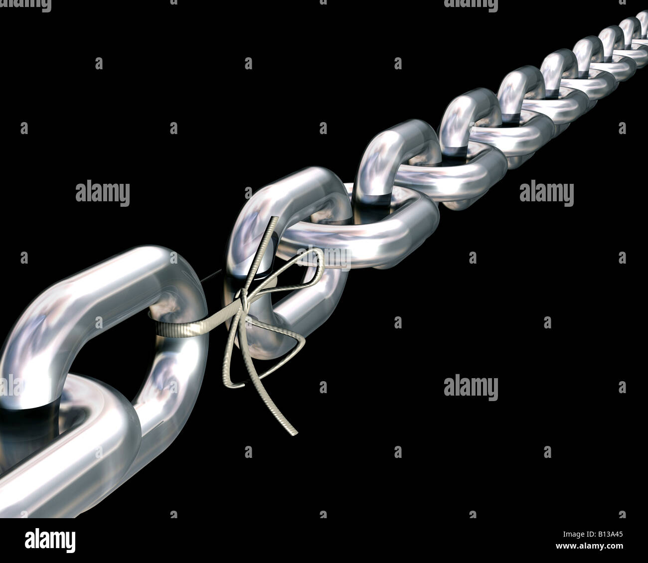 Impressive looking chain where one of the links has been replaced by a shoe lace Stock Photo