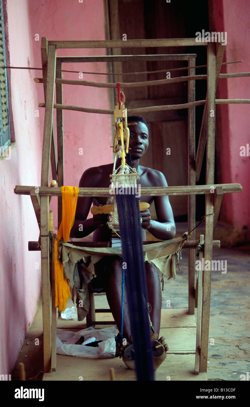 Kente Machine A man weaves kente cloth on a traditional loom, Bonwire, Ghana Stock ...