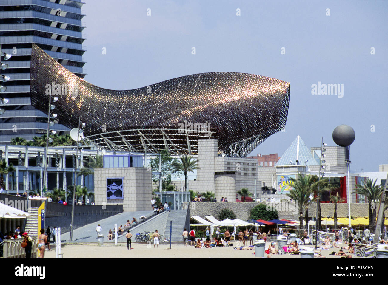 Golden Whale Sculpture Looms Over Barceloneta Beach, Villa Olympica Olympic Village, Barcelona, Spain Stock Photo