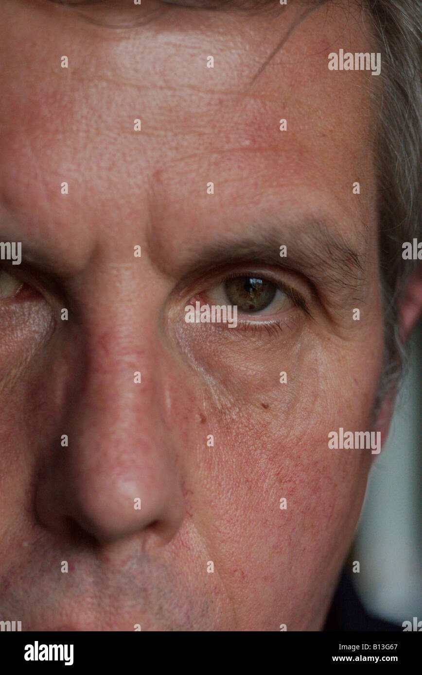 Close up eye and nose of middle aged British white caucasian male Stock Photo