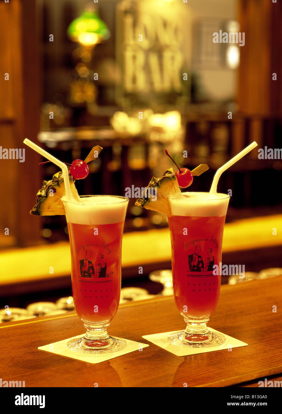 Singapore Sling cocktail on Long Bar of Raffles Hotel Singapore Stock