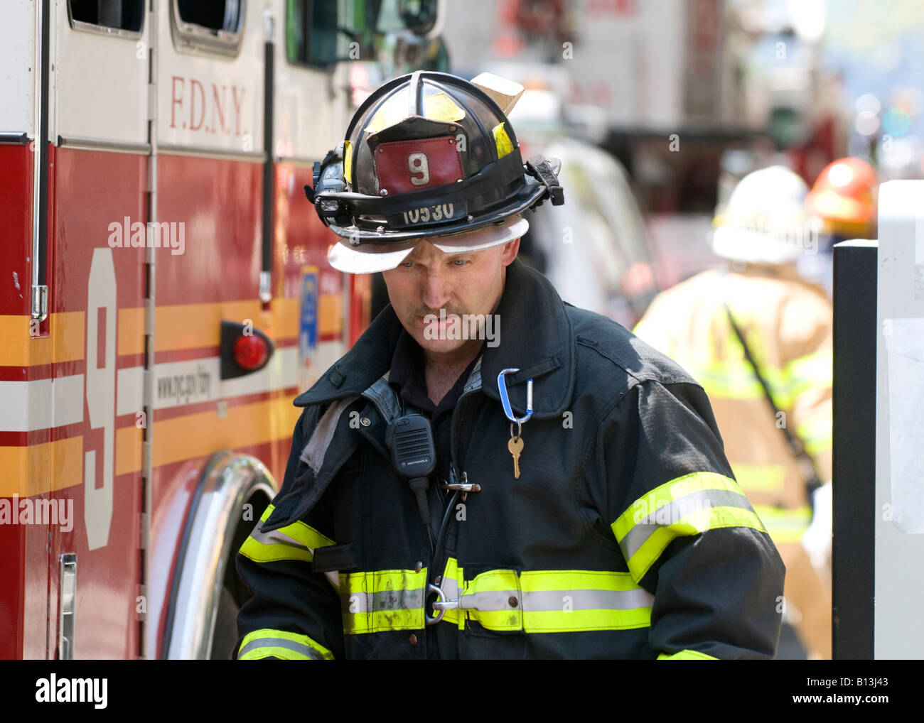 A New York fireman after attending a fire Stock Photo Alamy
