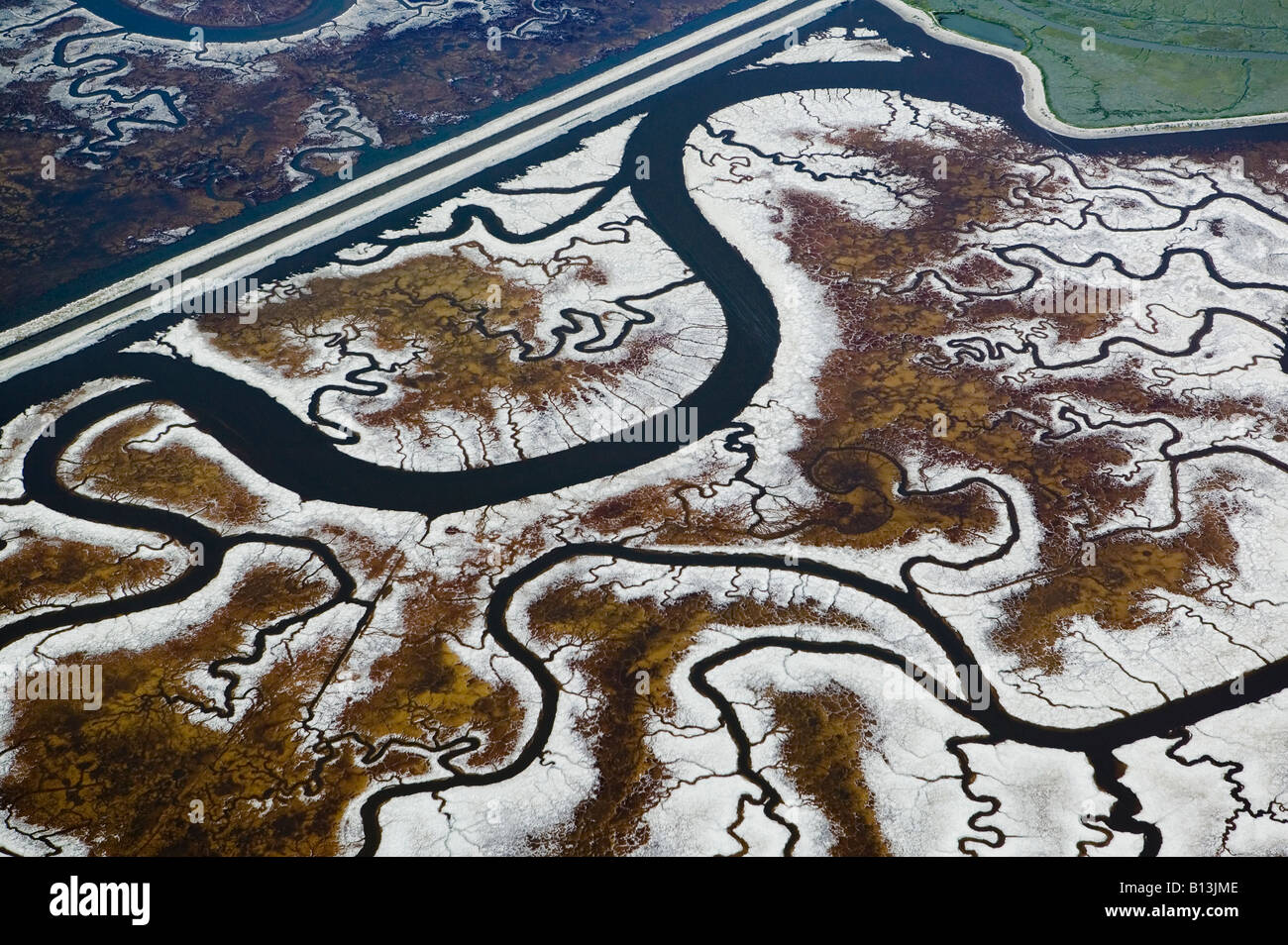 aerial above tidal channels in Newark California bay salt marsh channels Stock Photo