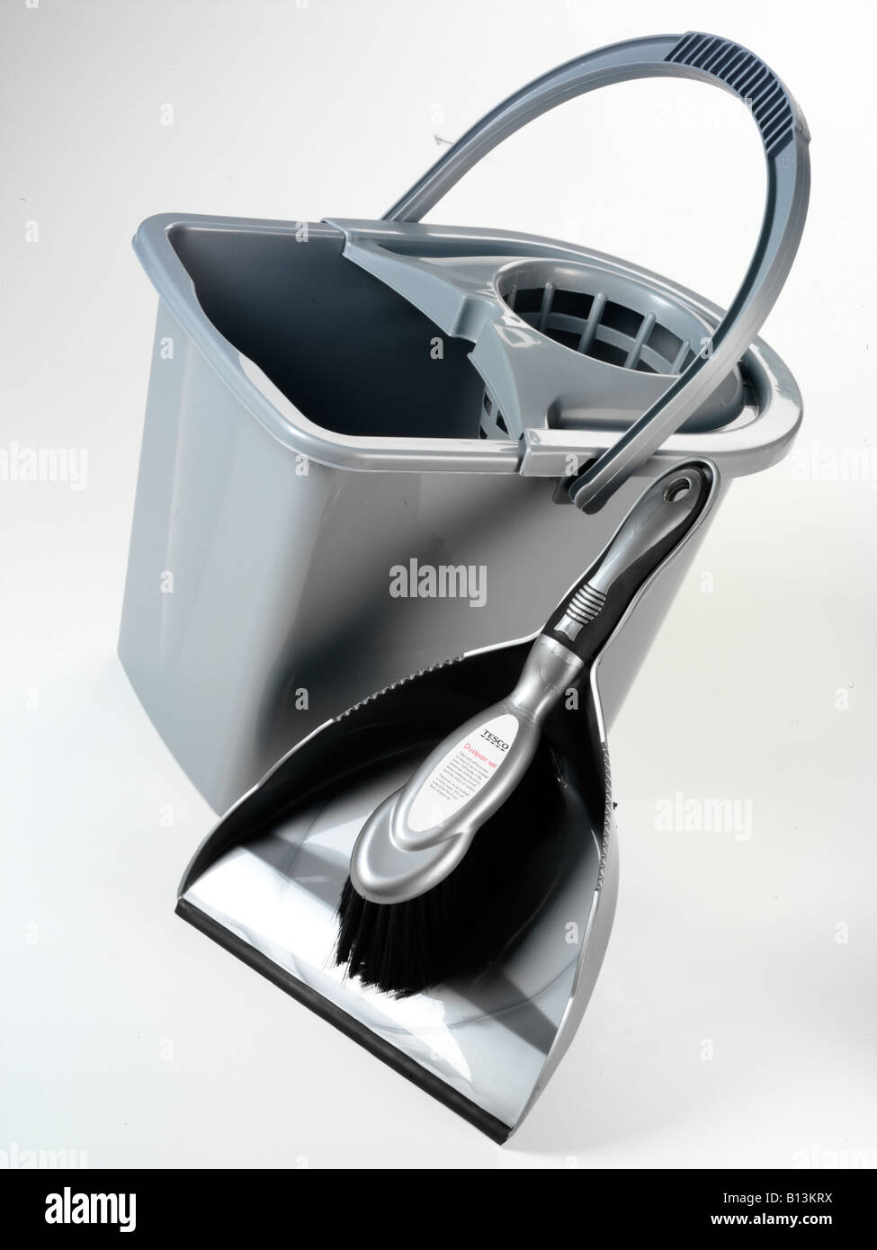 DUSTPAN AND BRUSH WITH BUCKET Stock Photo