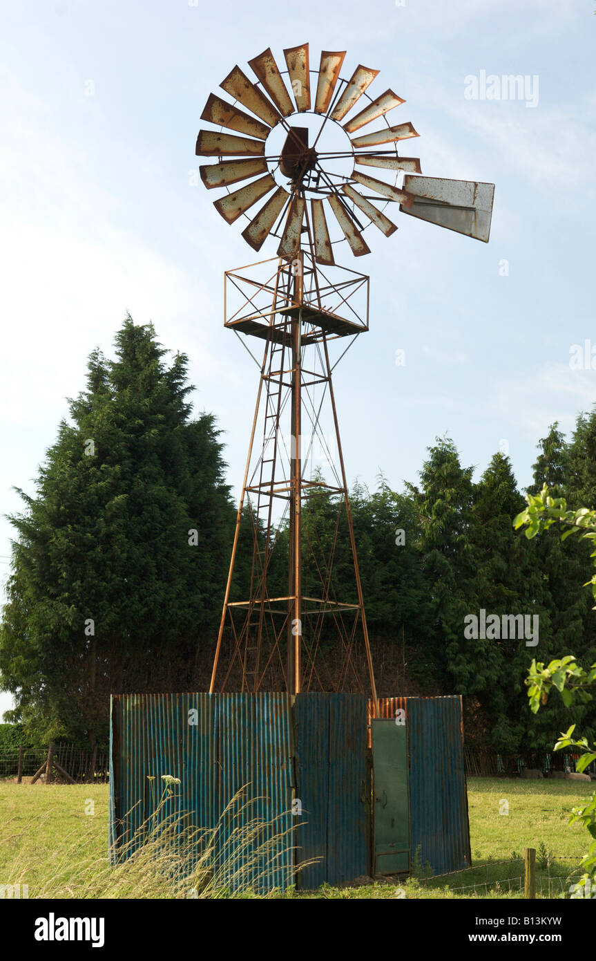 Old Windmill for pumping water for livestock Stock Photo Alamy