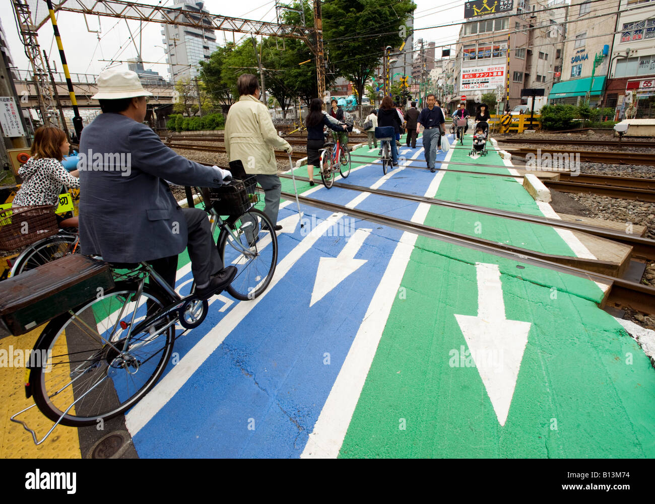 Busy pedestrian  railway crossing in central Tokyo Japan Stock Photo