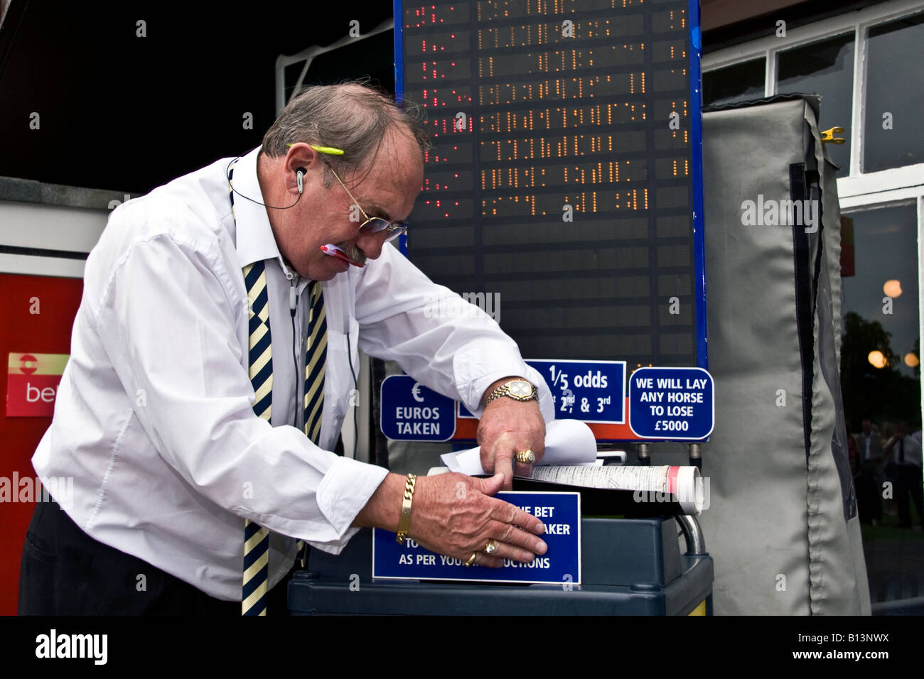 Bryan D Hazell bookmakers preparing for The Gold Cup Trophy event at the Perth racecourse in Scotland, UK Stock Photo