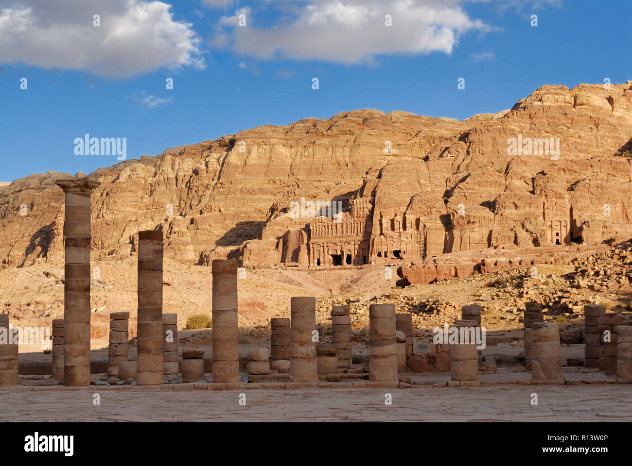 Royal Tombs in front of al Khubtha mountain, columns of the Great Temple Nabataean ancient town Petra Jordan Arabia Stock Photo