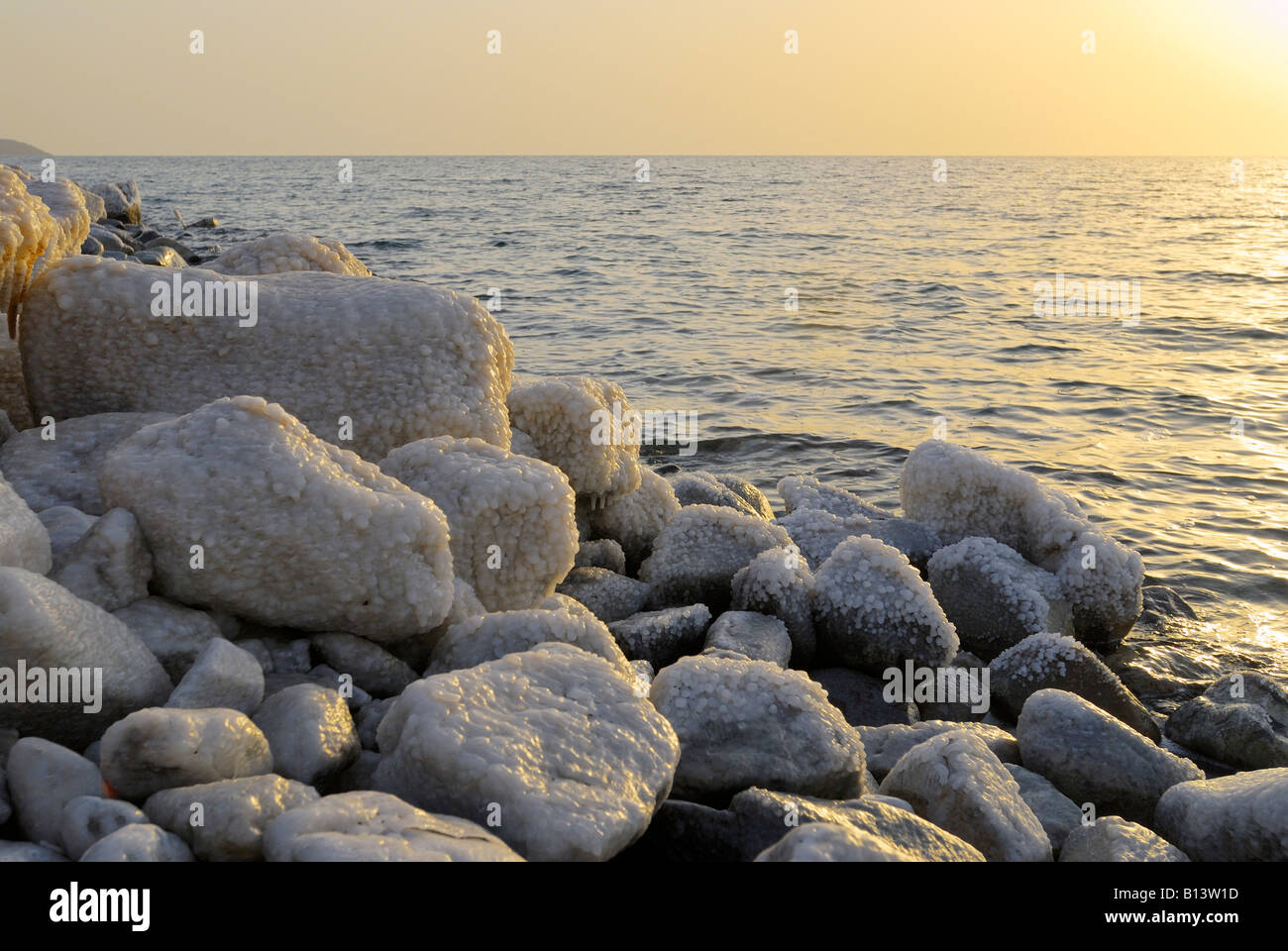 rocks with salt at coastline of Dead Sea Jordan Arabia, lowest place on earth Stock Photo