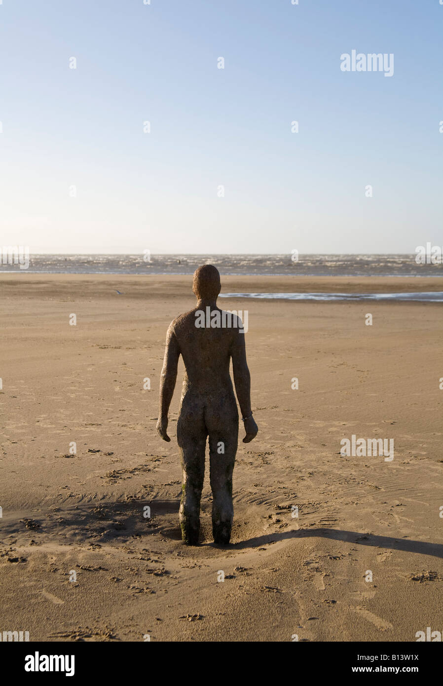 Statue, Crosby Beach, Antony Gormleys Another Place, Merseyside, England Stock Photo Alamy