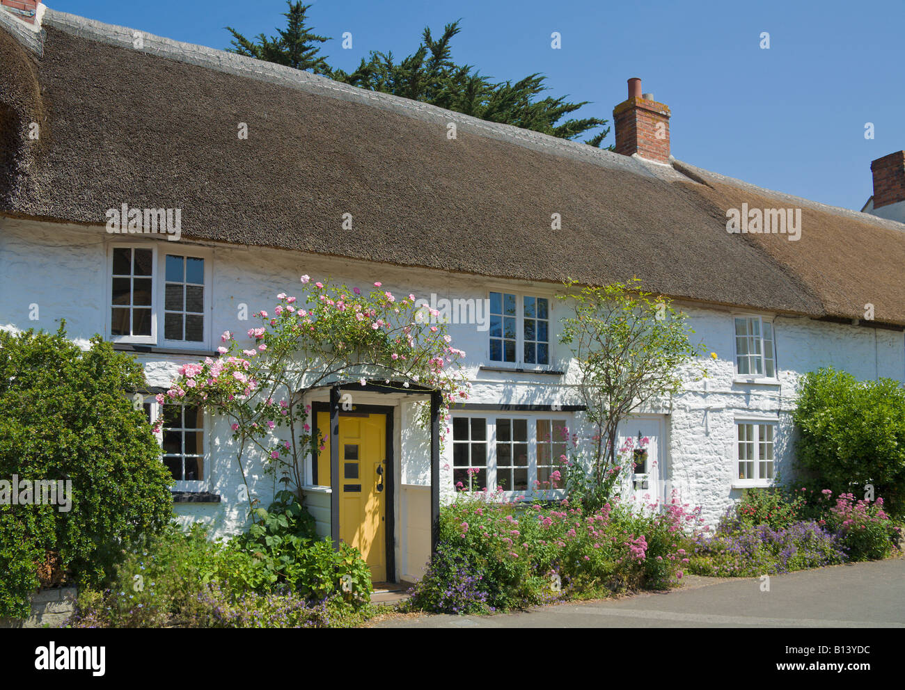 Thatched Cottages Burton Bradstock Dorset England Stock Photo