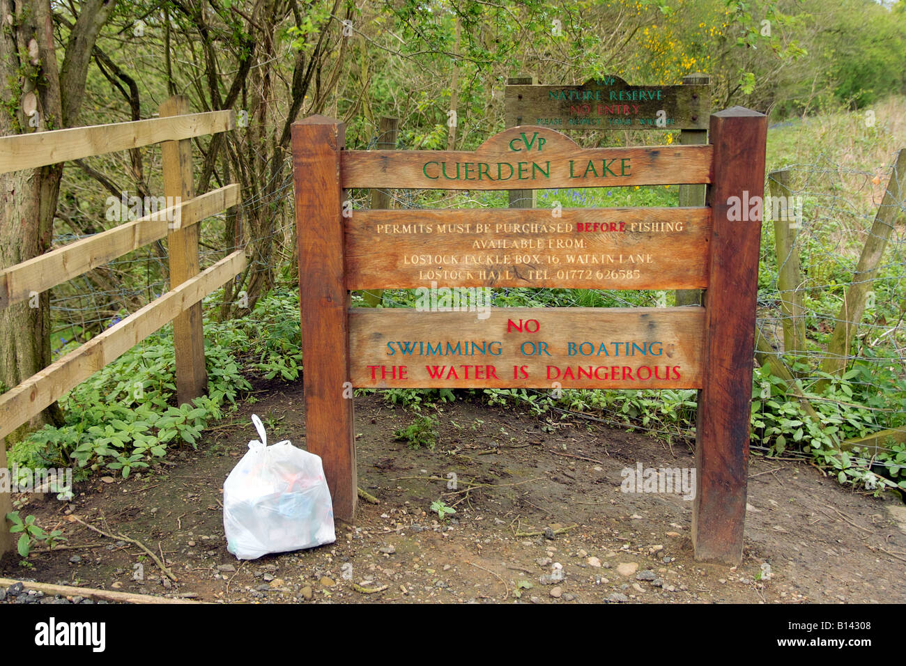 Rubbish dumped in a park. Stock Photo