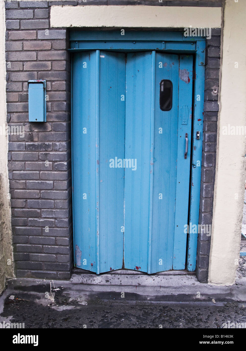 Old folding lift door Stock Photo Alamy
