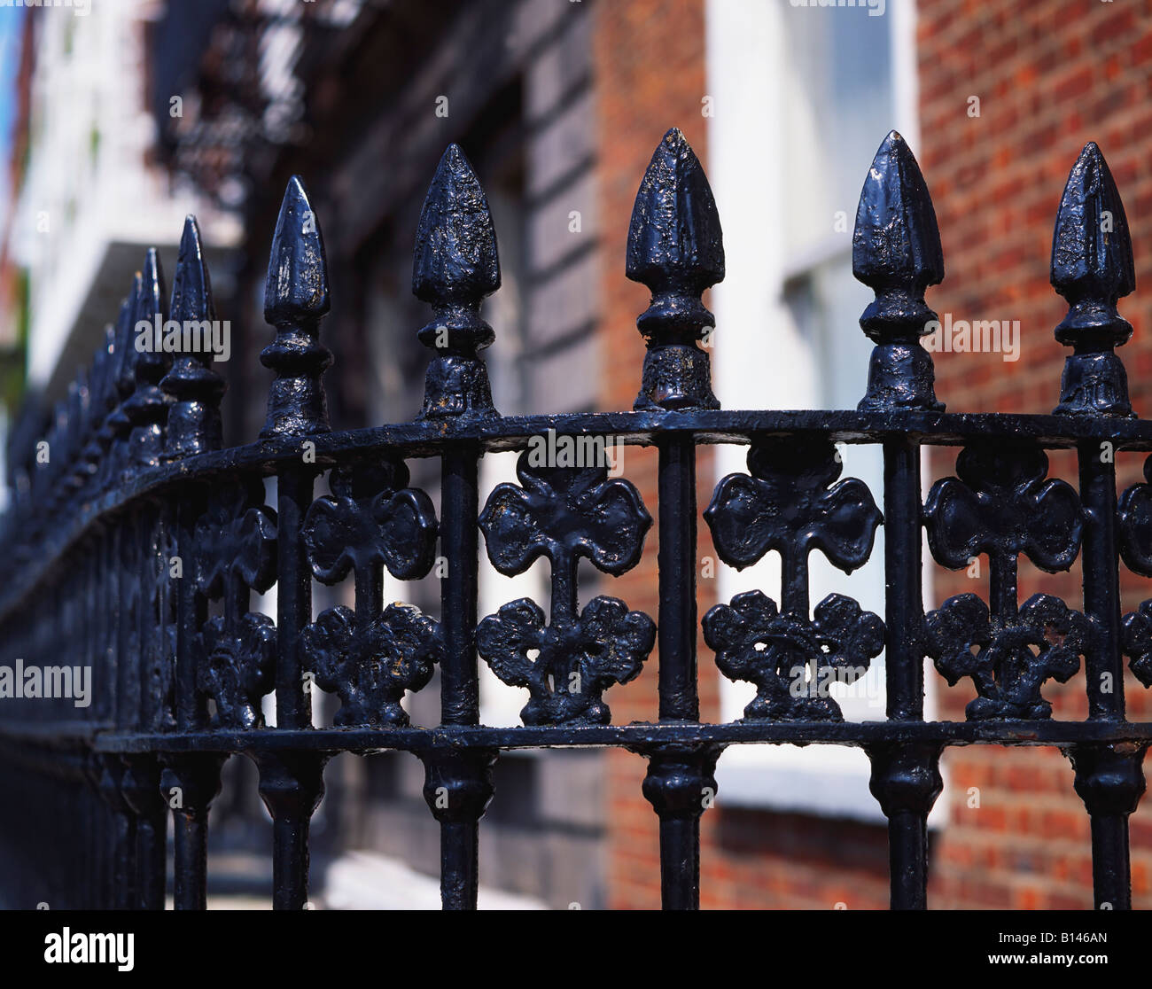 Wrought-iron fence with shamrock detail taken in Ireland Stock Photo