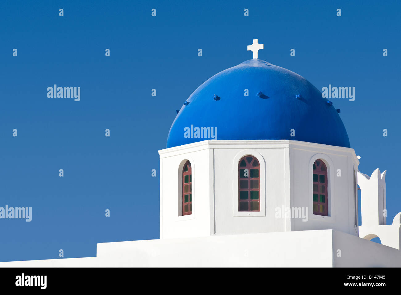 Blue and white dome of church in Oia Santorini Greece Stock Photo