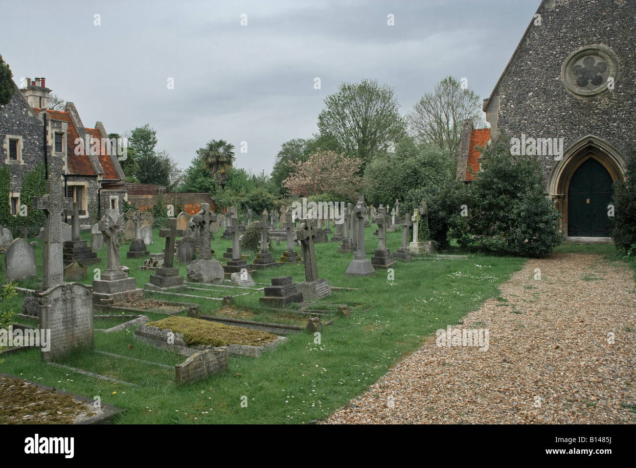 church england eton flint wall graveyard norman old walls Stock Photo