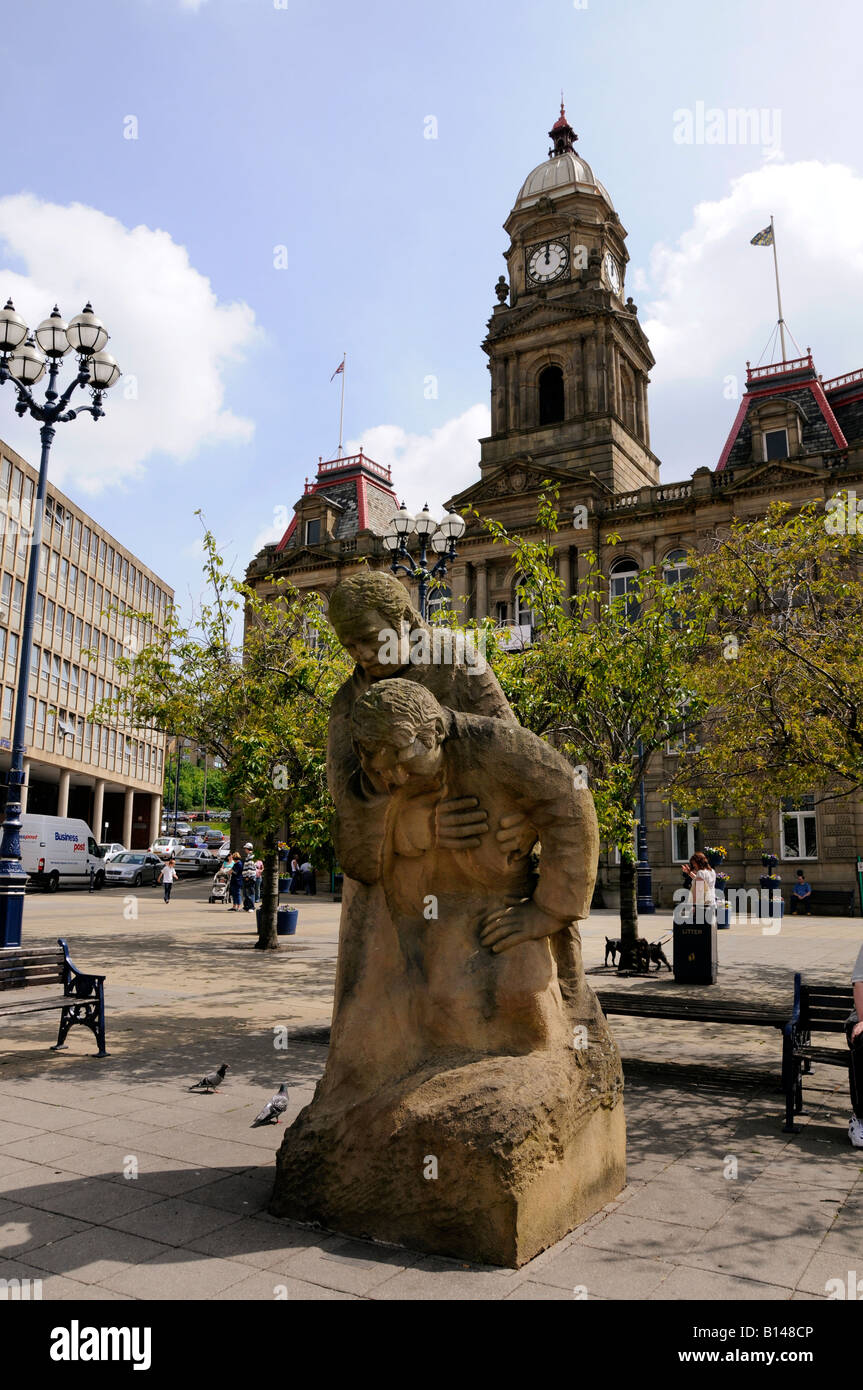 The Good Samaritan statue in front of the The Town Hall in Crackenedge
