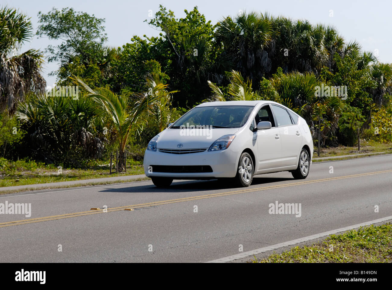 Gas-elecrtric hybrid car, Toyota Prius, on a road in Florida. Stock Photo