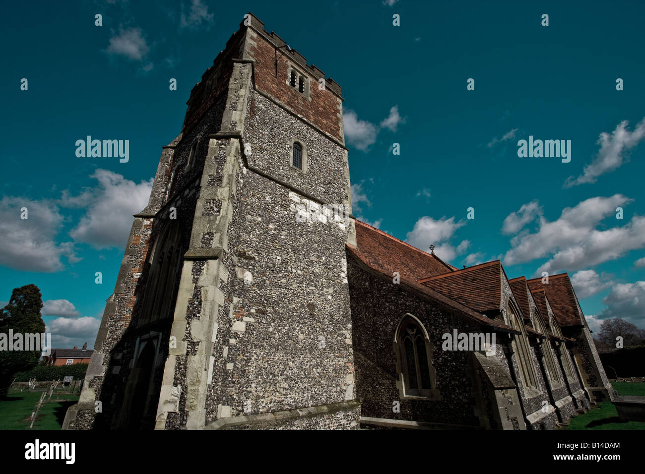 church england flint wall norman Stock Photo Alamy