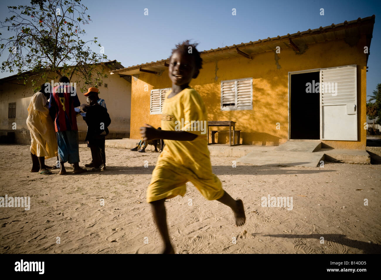 Children leave a classroom at the Bourofaye primary school in the village of Bourofaye Senegal on Wednesday June 13 2007 Stock Photo