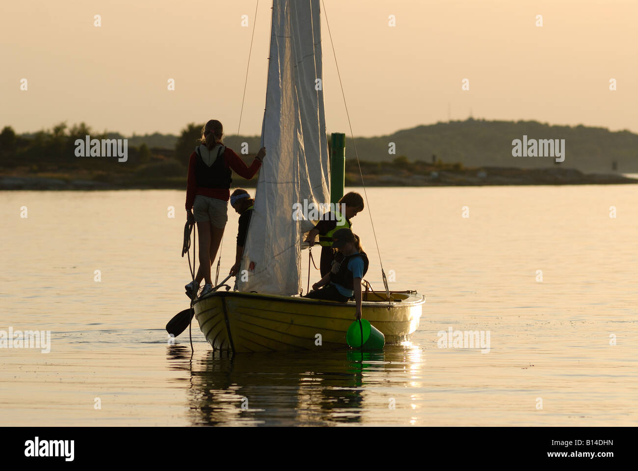 Sailing boat at dusk, Sweden, west coast Stock Photo