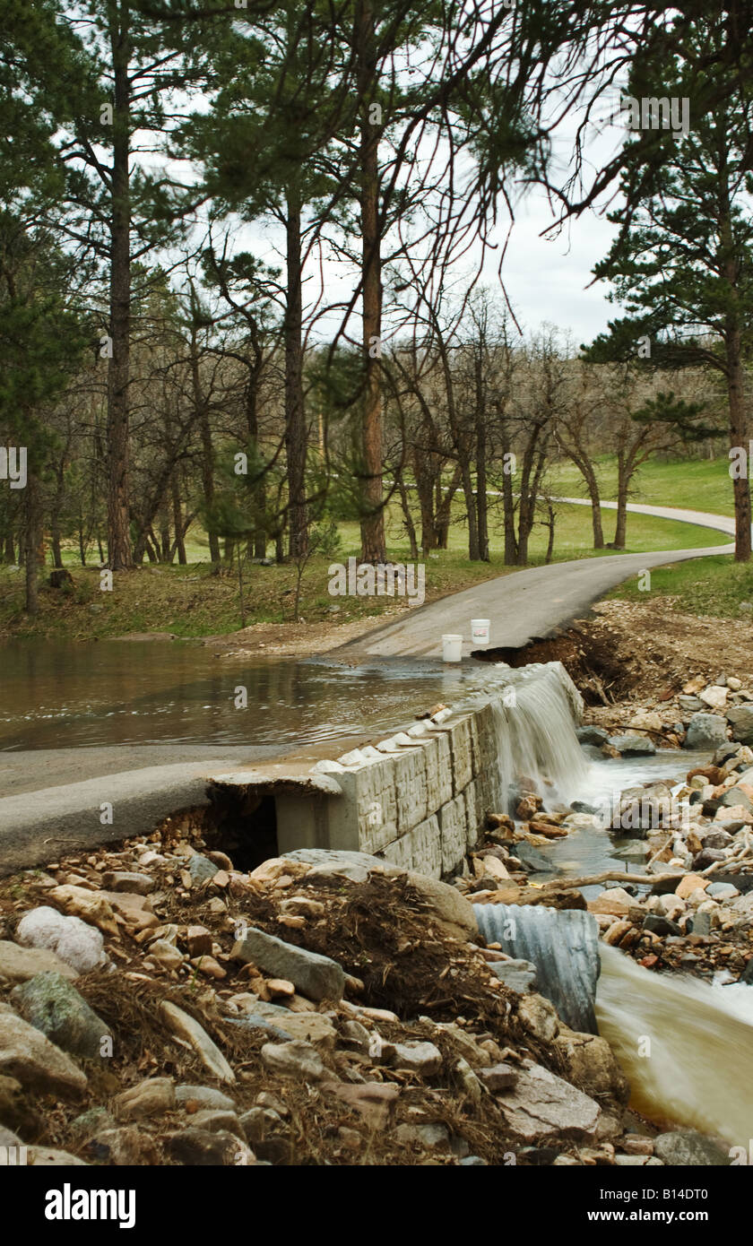 Flooded driveway caused by May blizzard followed by several days of rain in Spearfish, South Dakota, USA Stock Photo