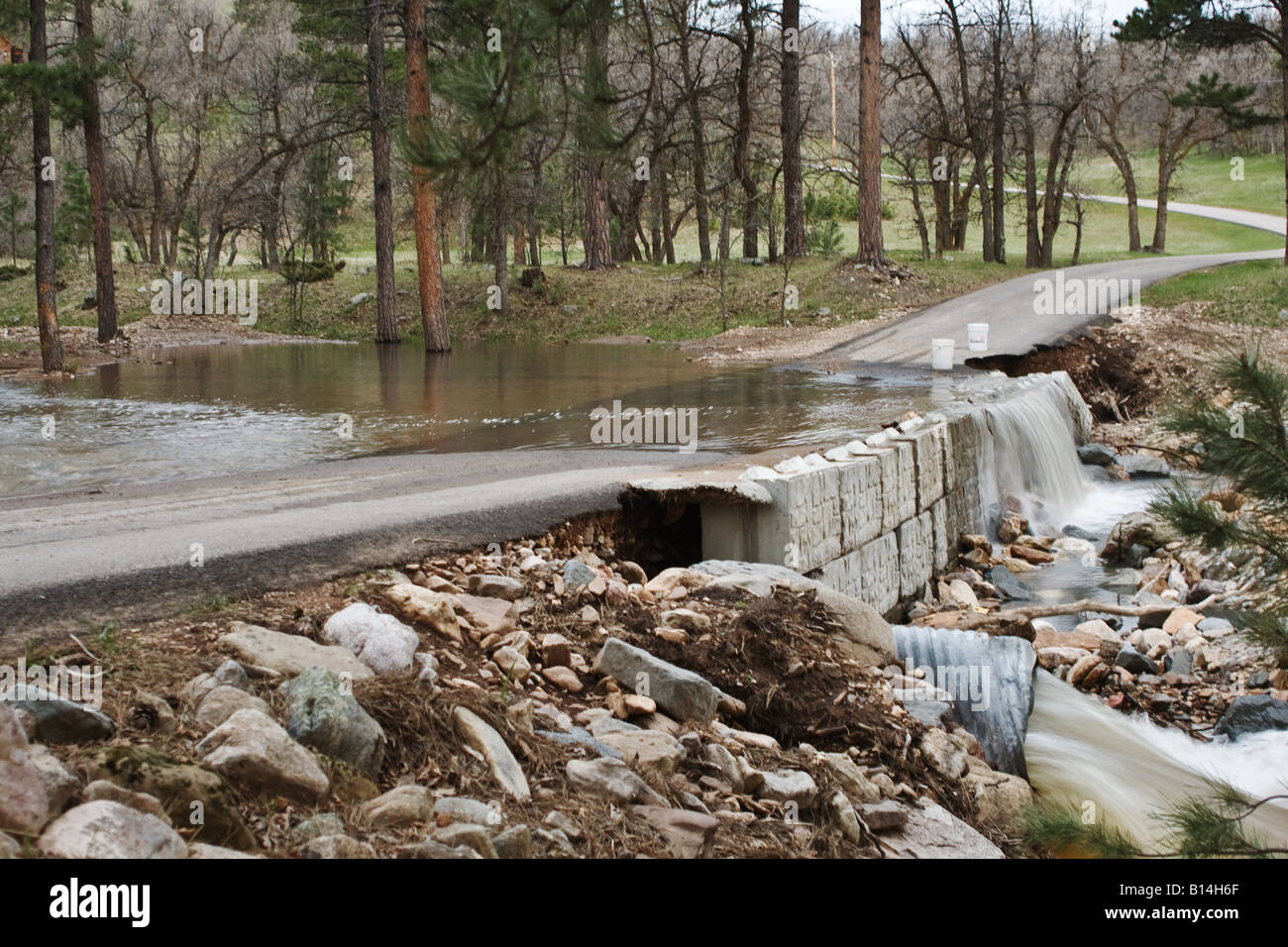 Flooded driveway caused by May blizzard followed by several days of rain in Spearfish South Dakota Stock Photo