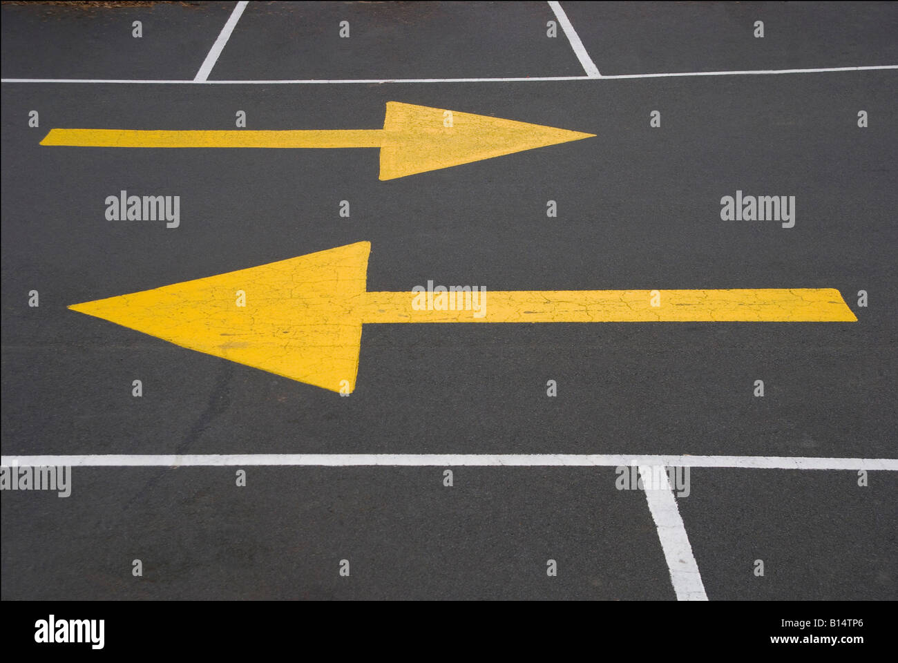 Two arrows pointing in opposite directions hires stock photography and