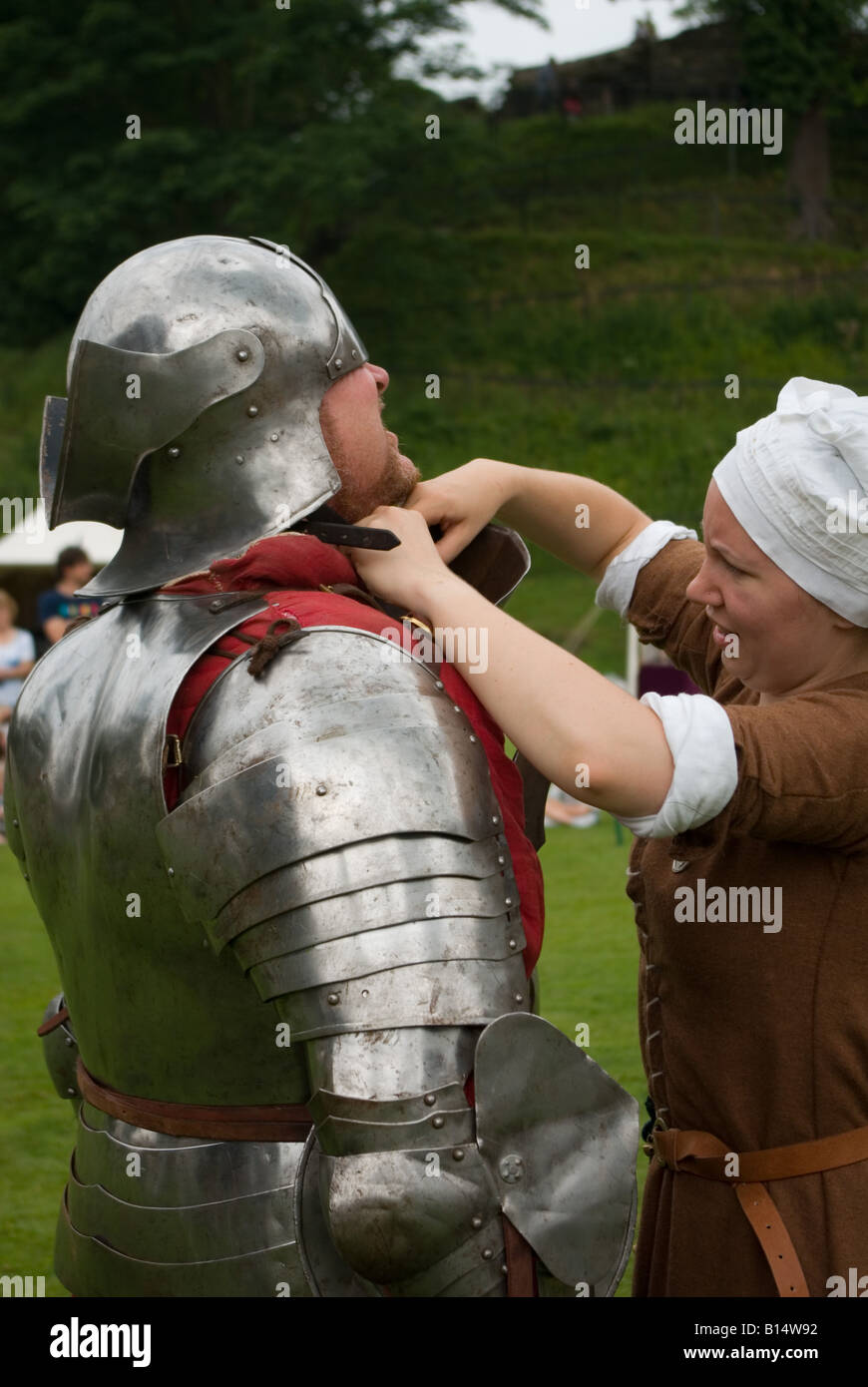 maid-fixing-knight-s-helmet-stock-photo-alamy
