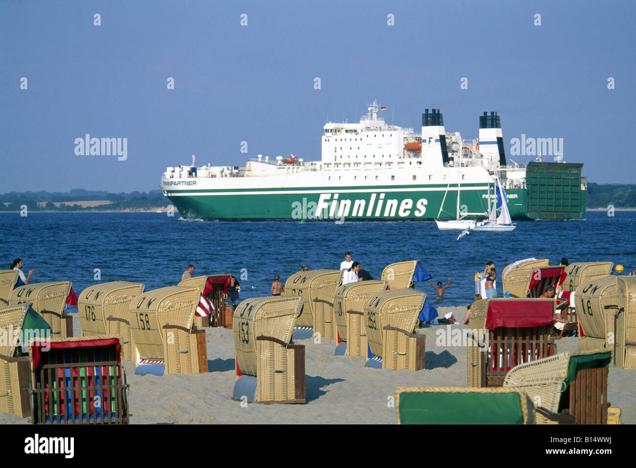 Ferry and beach nearby Travemuende Luebecker Bucht Schleswig Holstein Germany Stock Photo