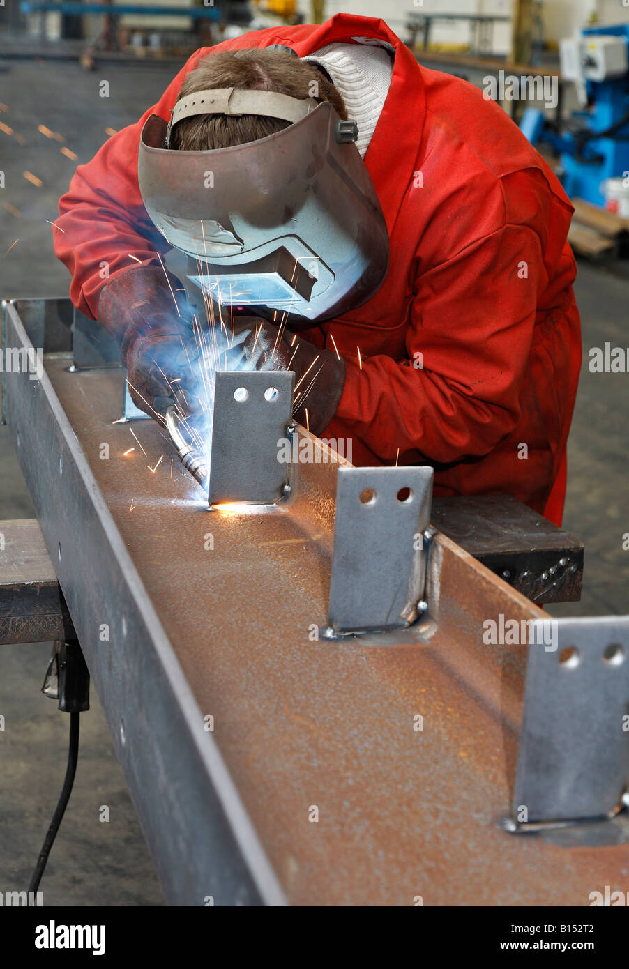 Metal workers in a factory Stock Photo