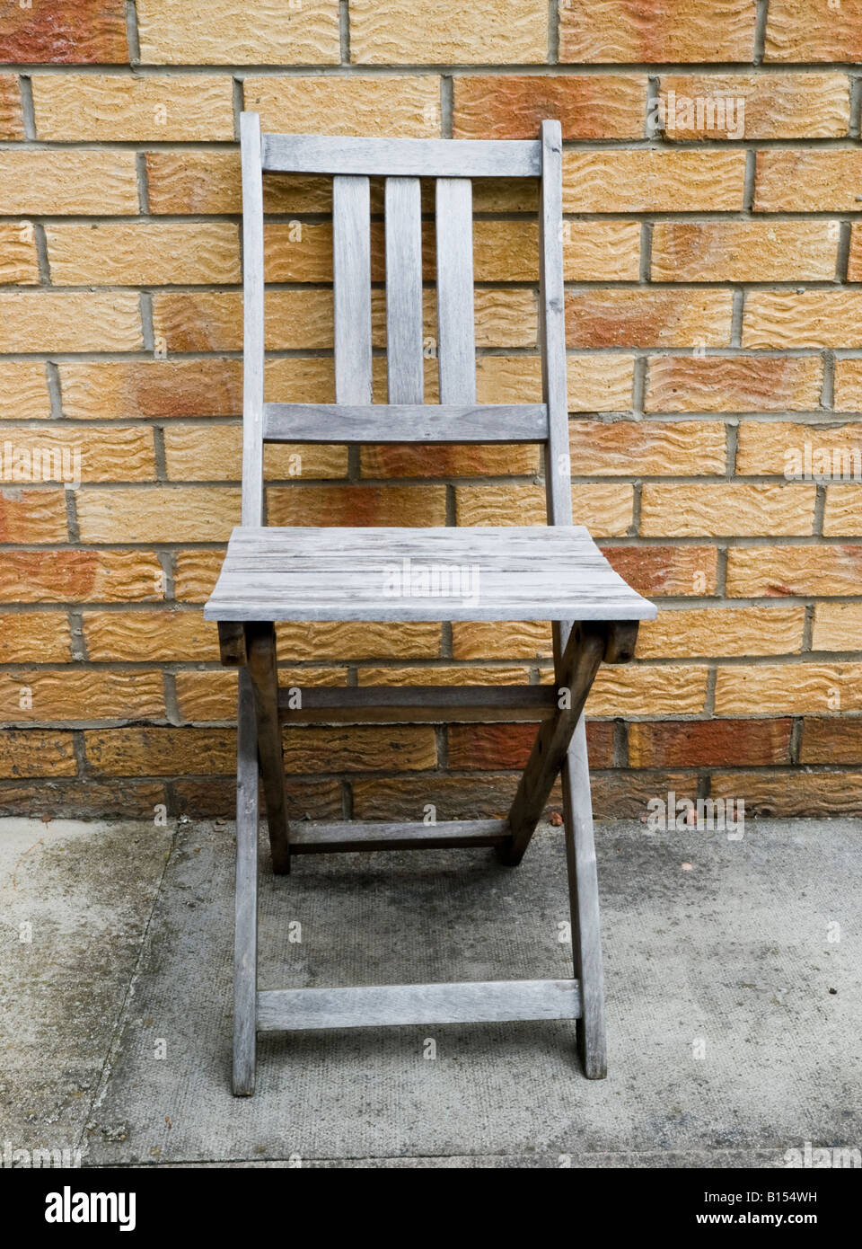 Empty wooden chair hi-res stock photography and images - Alamy