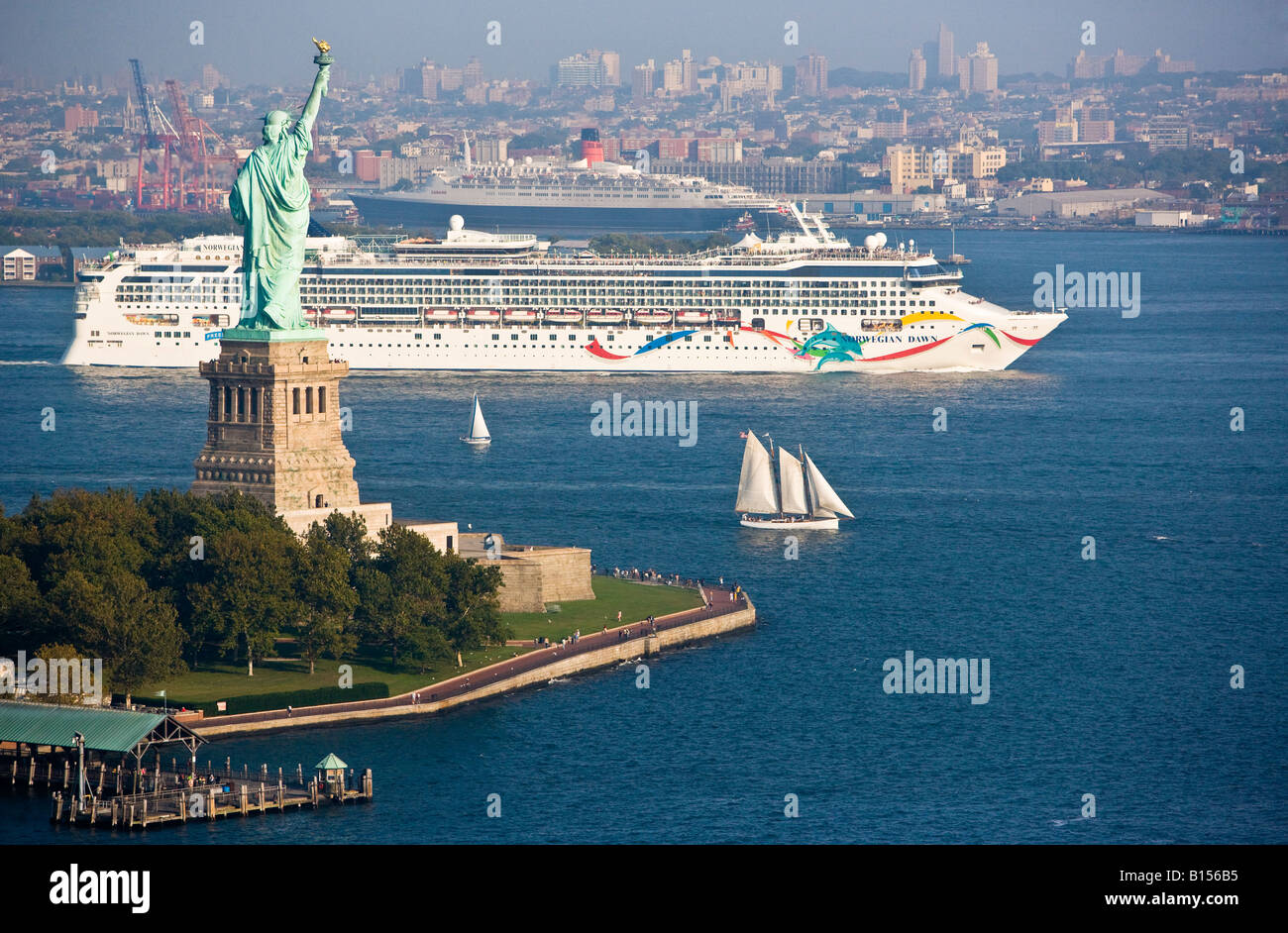 Aerial view of the Statue of Liberty with cruise ship Norwegian Dawn