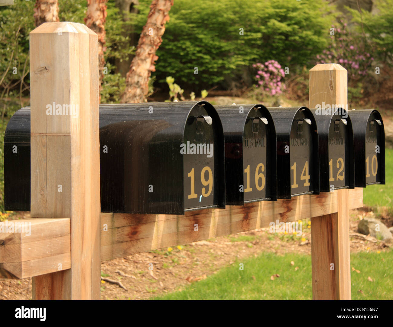A row of US Mail boxes Stock Photo