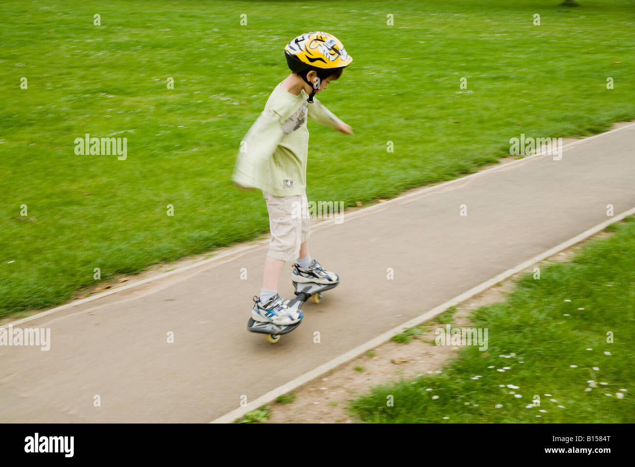 People Summer bike bmx children marlow park playing skate boarding Stock Photo