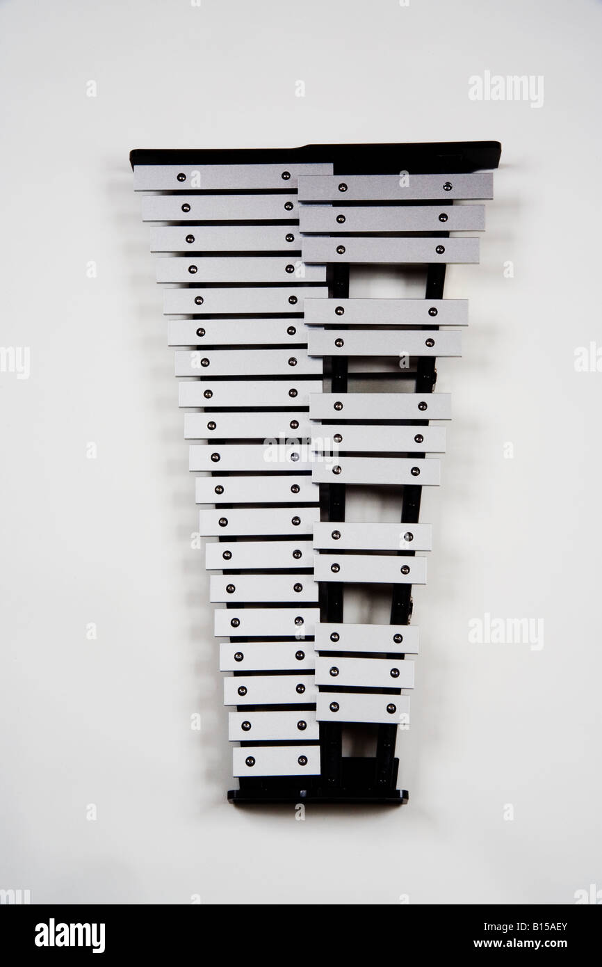 The glockenspiel is a musical instrument in the percussion family with tuned metal bars laid out in a fashion similar to a piano Stock Photo