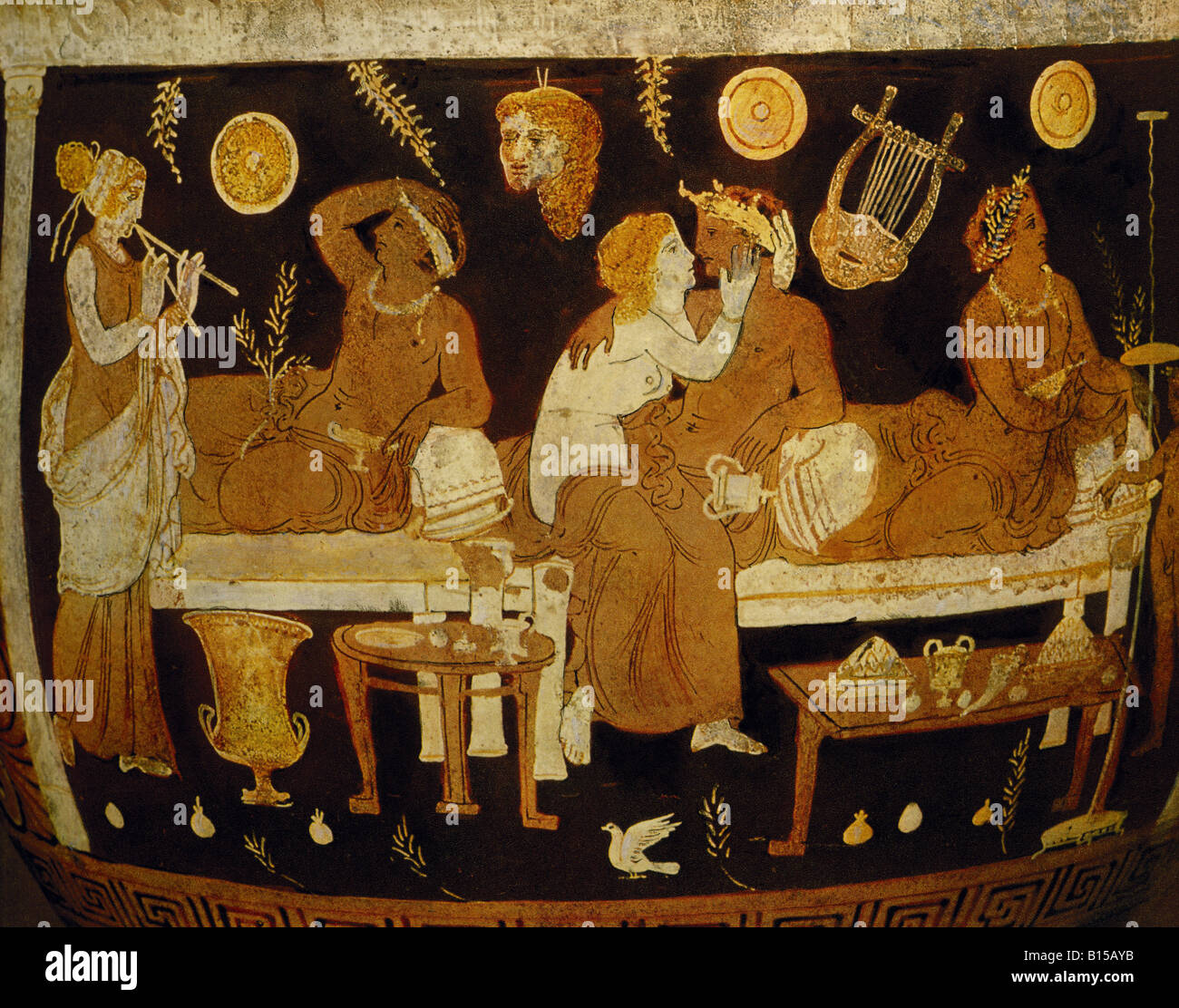 fine arts, ancient world, Campania, vase painting, banquet with flute player, hetaeras and juveniles, red-figured style, detail, krater, by the 'C.A. Painter', circa 340 B.C., Museo Nazionale, Naples, Artist's Copyright has not to be cleared Stock Photo